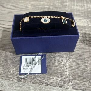 Swarovski Symbolica bracelet
Crystal pearl, Clover, evil eye and horse shoe
